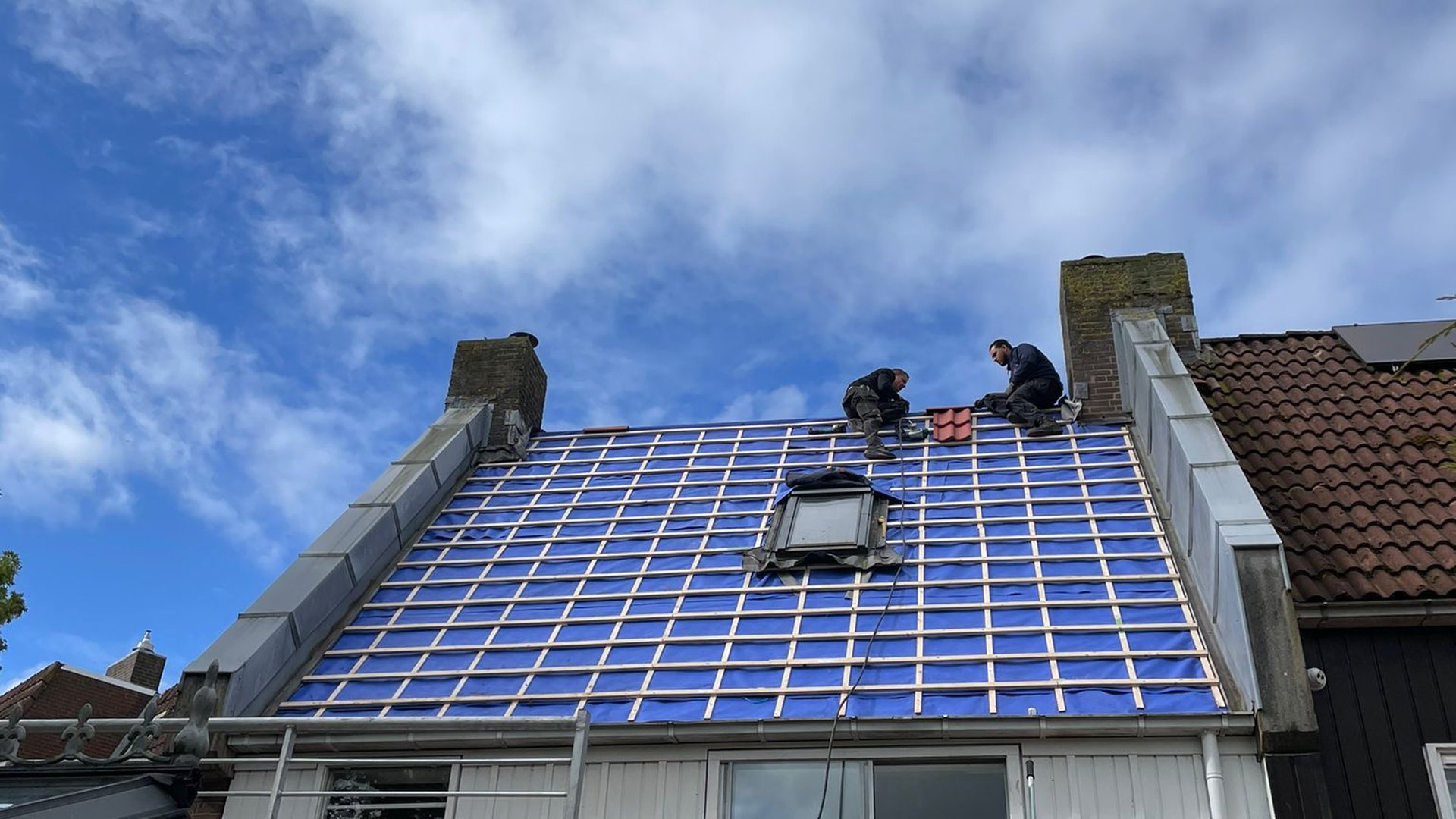 Dakdekkers aan het werk